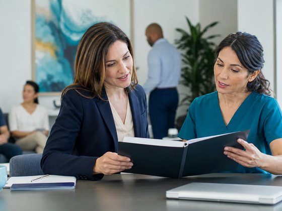 Care advisor reviewing a wellness plan with a patient